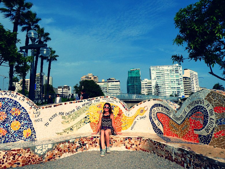 Colourful mosaic bench with skyscrapers in the background