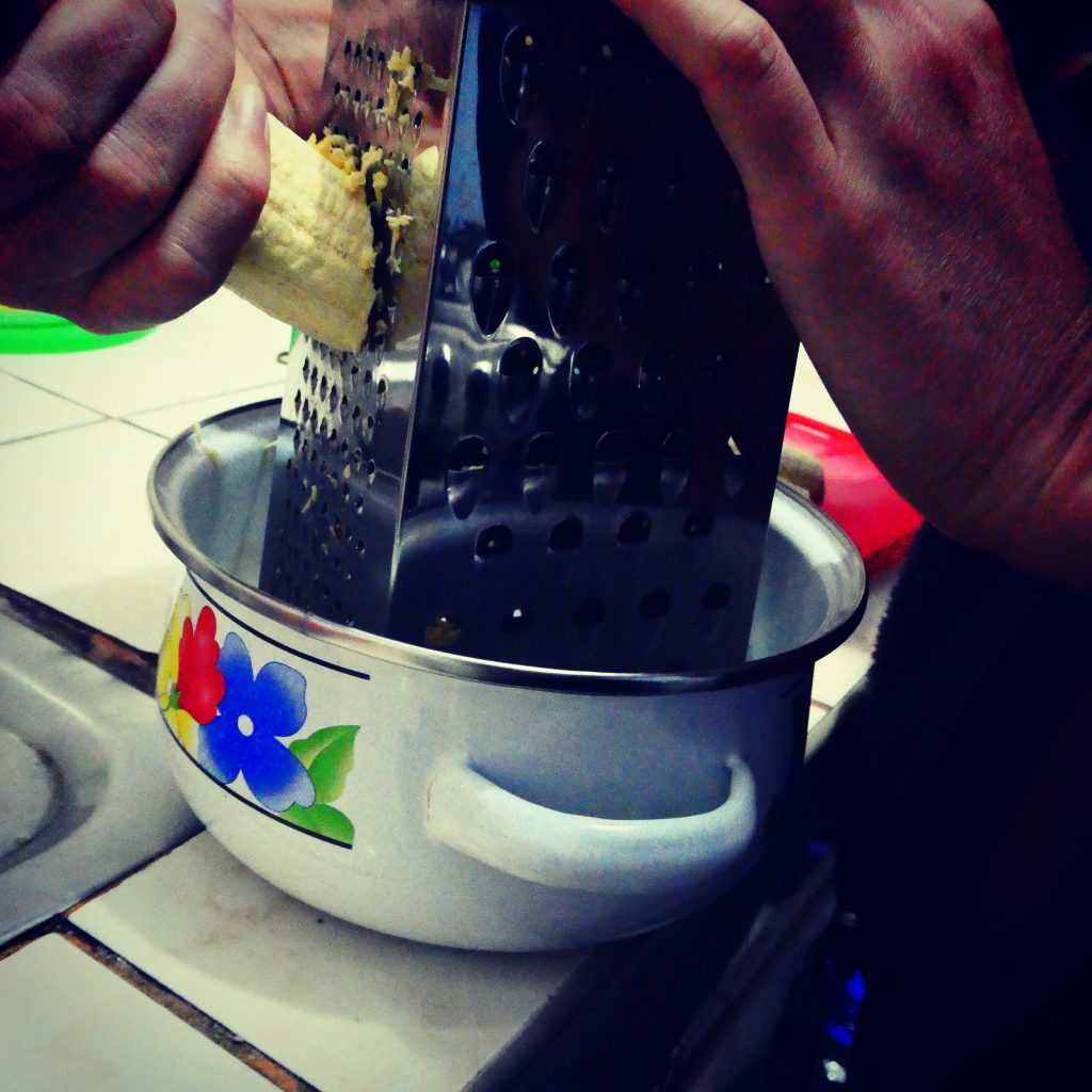 Grating green plantain