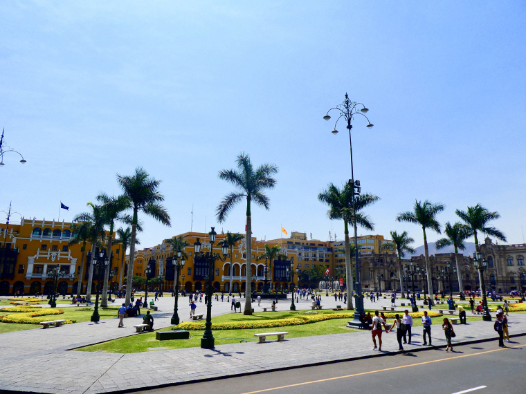Lima Main square with colonial buildings and palm trees