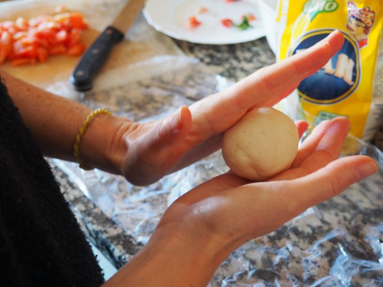 Arepas forming with hands